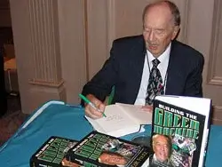 Warren signs copies of the recently released