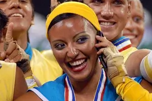 A Blue Devils member makes a celebratory call
