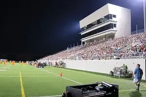 Fans packed Wildcat-Ram Stadium Thursday in Dallas.