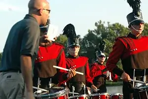 Field percussion judges get an up-close view ofpercussion lines during DCI competitions.