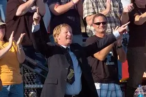 George Parks conducts the Minuteman Marching Band at Allentown's J. Birney Crum Stadium.