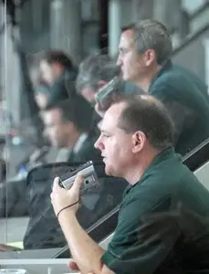 Judges look on from the press box.